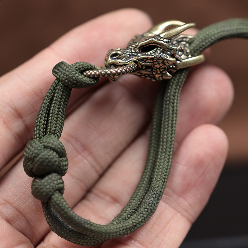 屋外用のドラゴンヘッド付き真ちゅう製バックル,パラコード,D - Paracord Survival Bracelet のレビューと価格