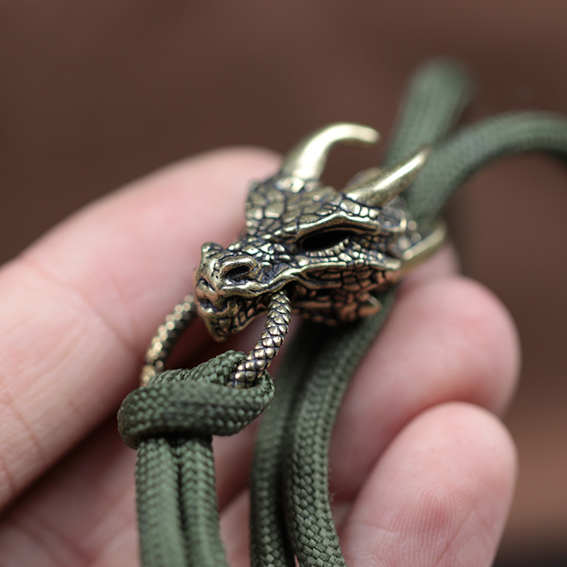 屋外用のドラゴンヘッド付き真ちゅう製バックル,パラコード,D - Paracord Survival Bracelet のレビューと価格